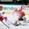 MINSK, BELARUS - MAY 12: Switzerland's Reto Berra #20 makes the save against Belarus' Geoff Platt #16 during preliminary round action at the 2014 IIHF Ice Hockey World Championship. (Photo by Andre Ringuette/HHOF-IIHF Images)

